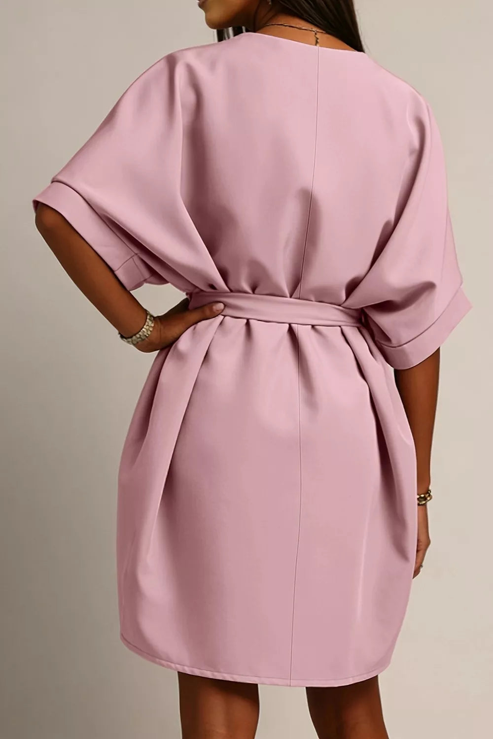 Dusty pink tie-waist batwing sleeve dress, back view with waist tie