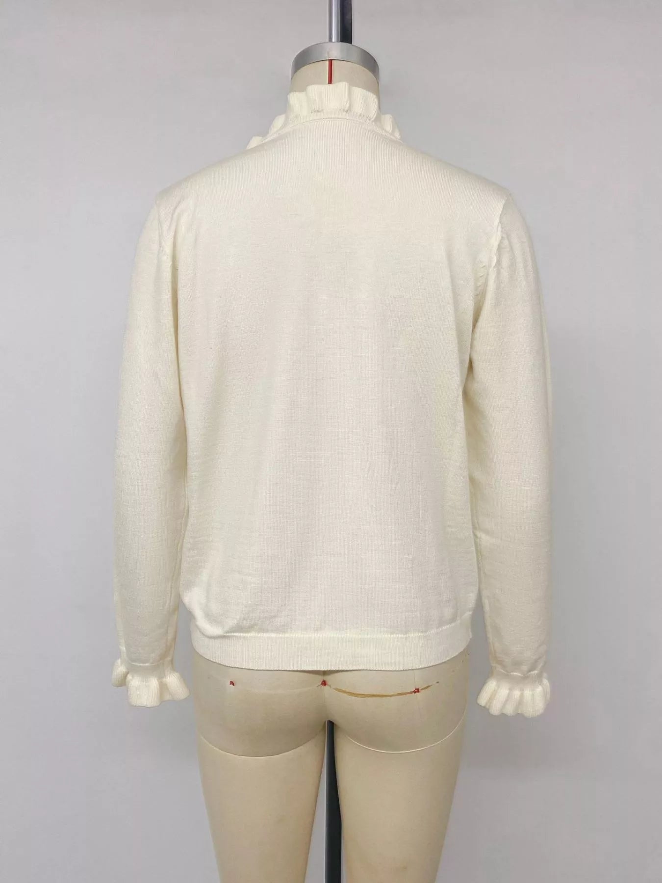Apricot knit top back view with long sleeves