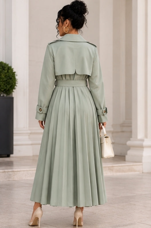 Side view of a sage-green belted trench coat on model