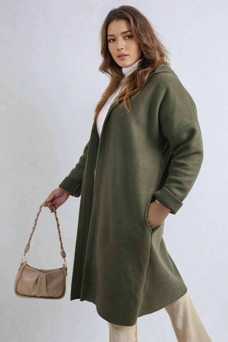 "Open front long green coat jacket with folded sleeves, perfect for layering and adding effortless elegance to any outfit."