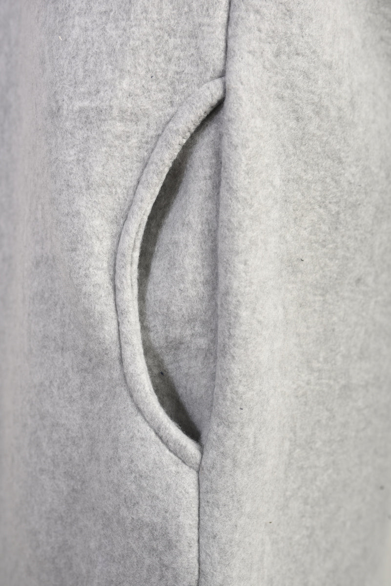 "Open front grey long coat jacket with folded sleeves, perfect for layering and adding effortless elegance to any outfit."