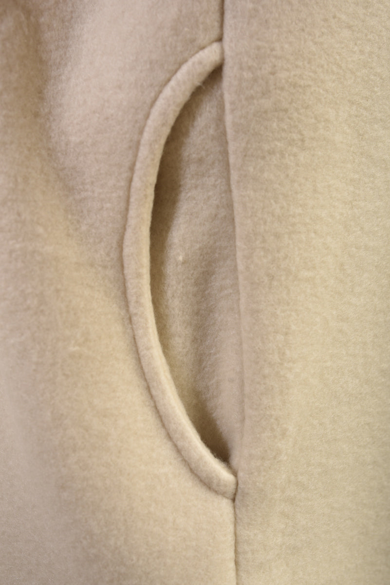 "Open front beige long coat jacket with folded sleeves, perfect for layering and adding effortless elegance to any outfit."