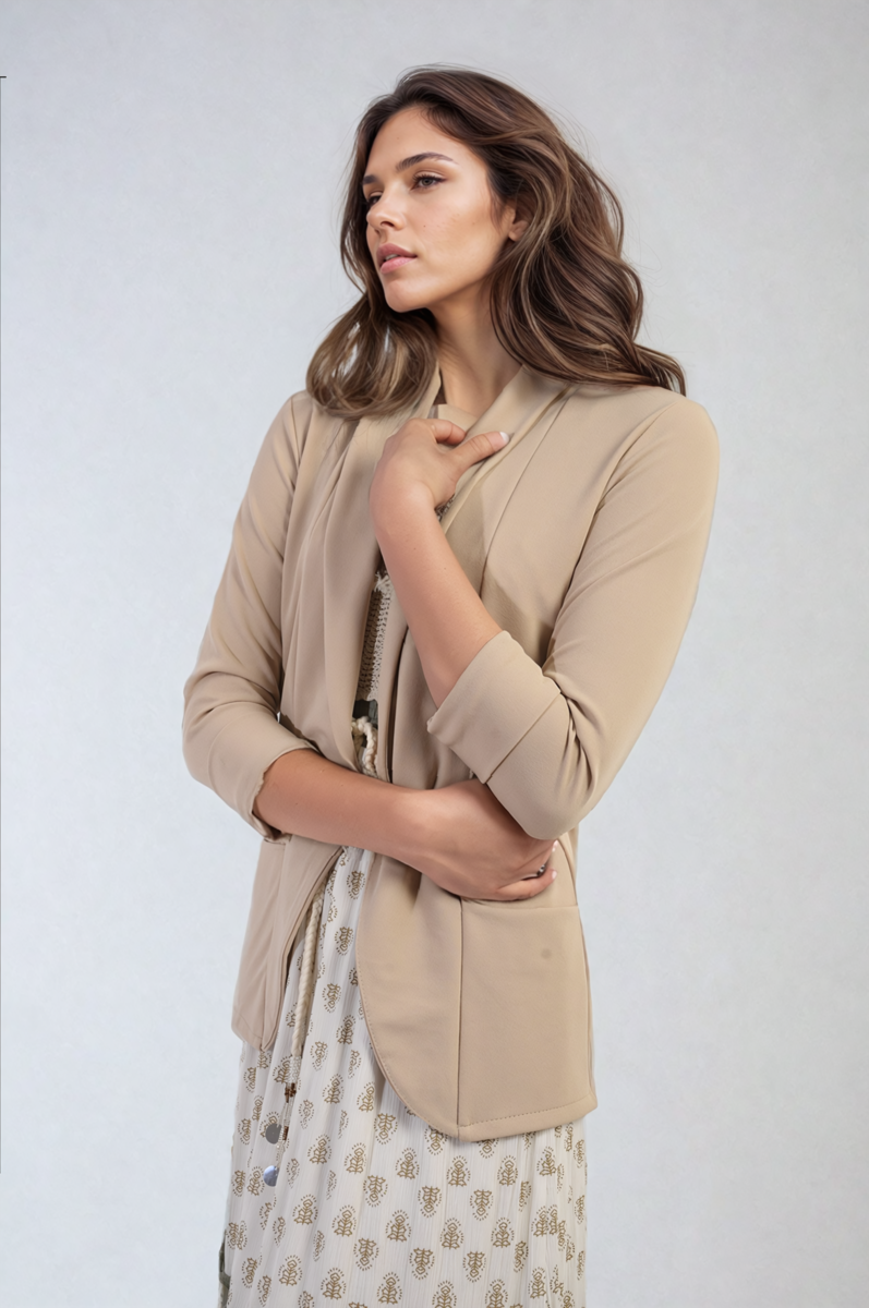 "Open front beige cardigan with cozy design and front pockets, perfect for versatile and stylish wear."