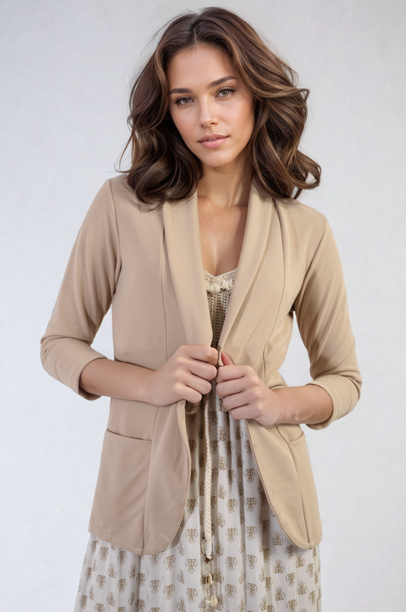 "Open front beige cardigan with cozy design and front pockets, perfect for versatile and stylish wear."
