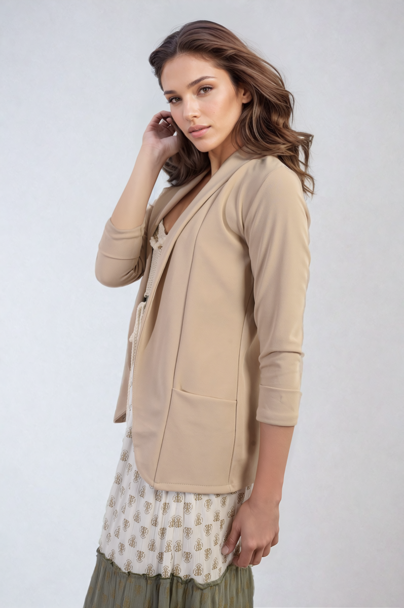 "Open front beige cardigan with cozy design and front pockets, perfect for versatile and stylish wear."