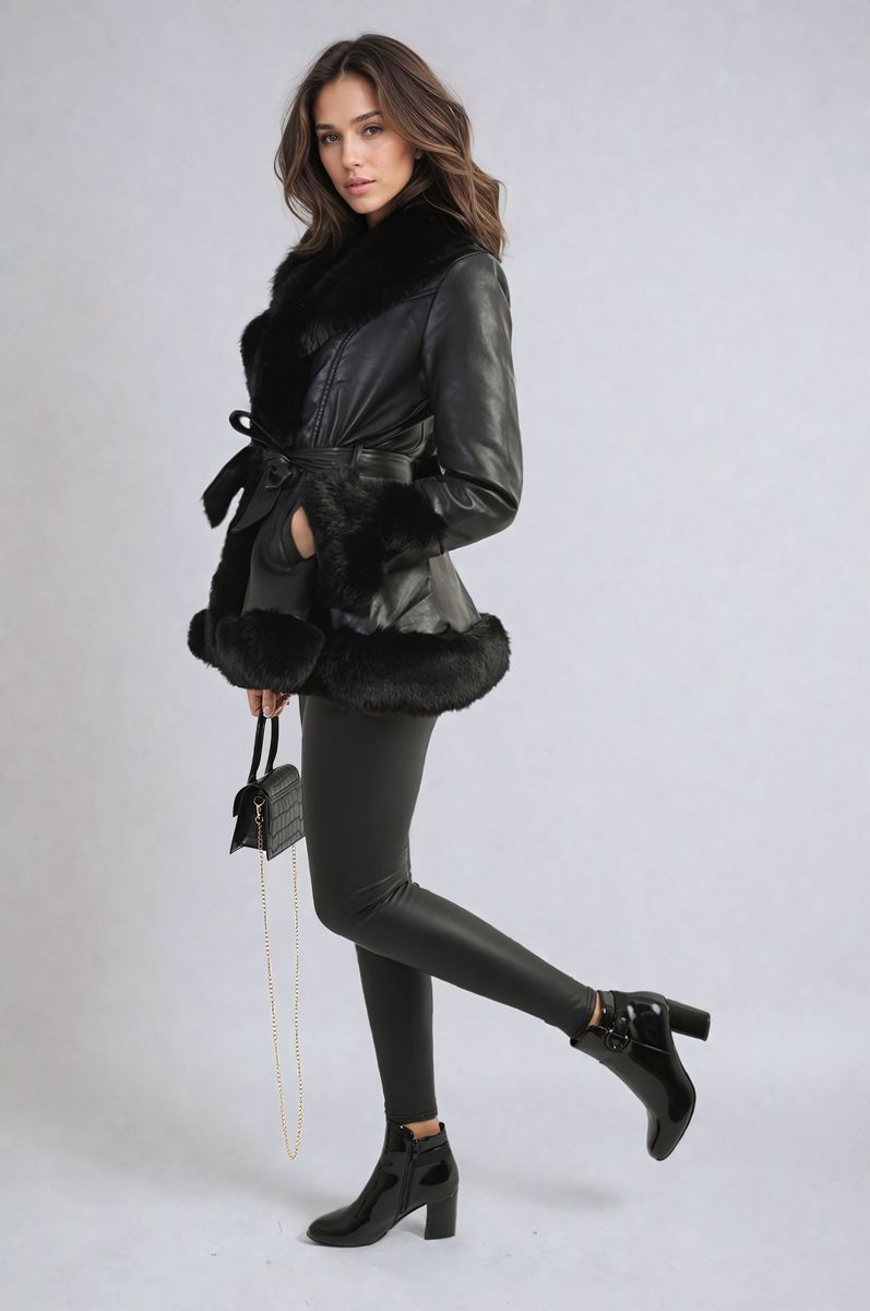 "Model wearing a faux fur trim winter jacket, ideal for cold weather fashion."
