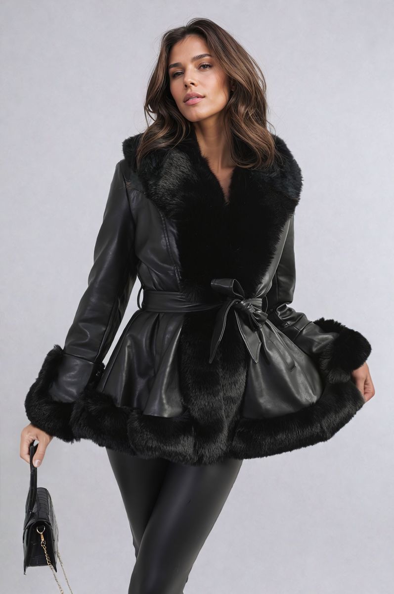 "Model wearing a faux fur trim winter jacket, ideal for cold weather fashion."
