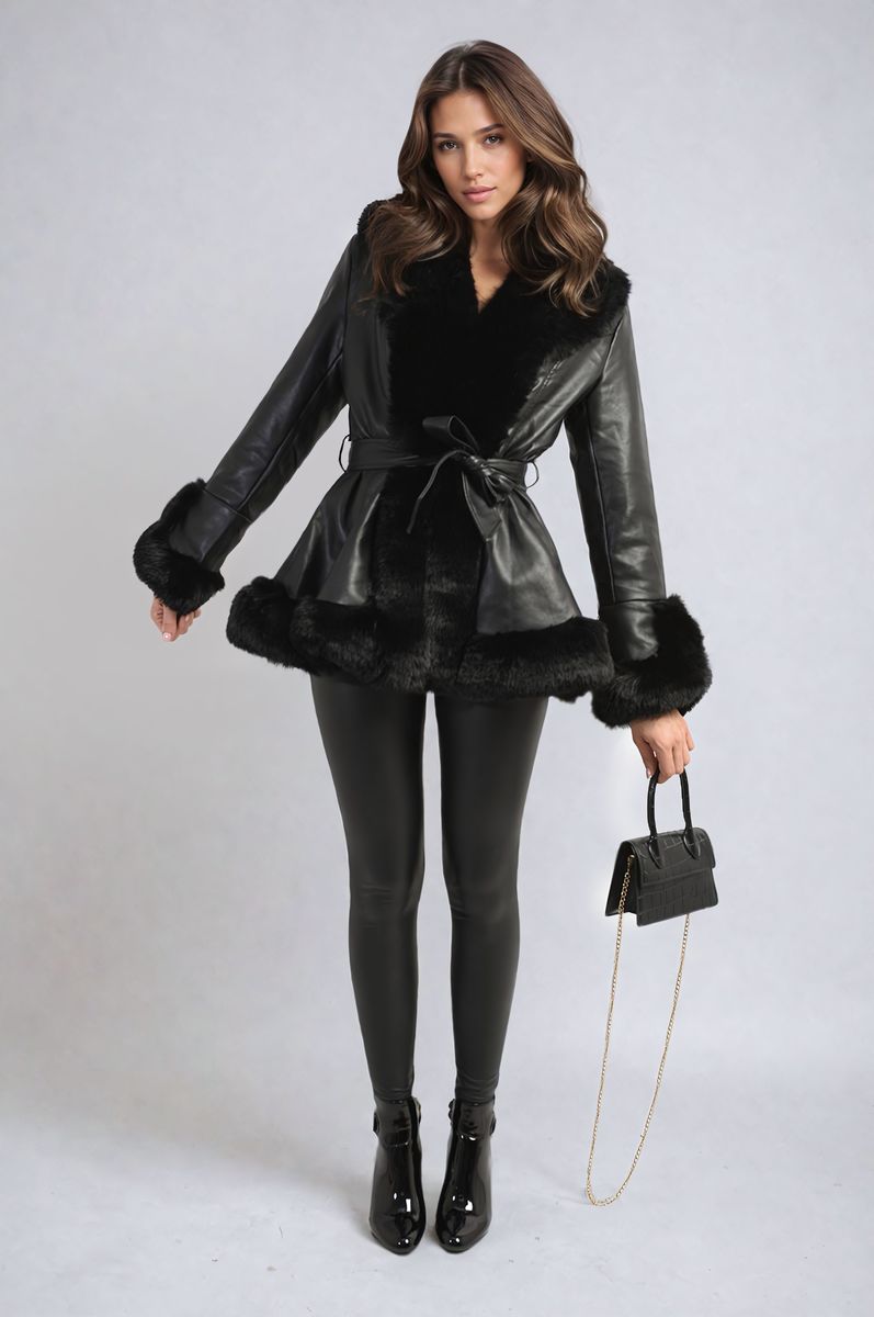 "Model wearing a faux fur trim winter jacket, ideal for cold weather fashion."