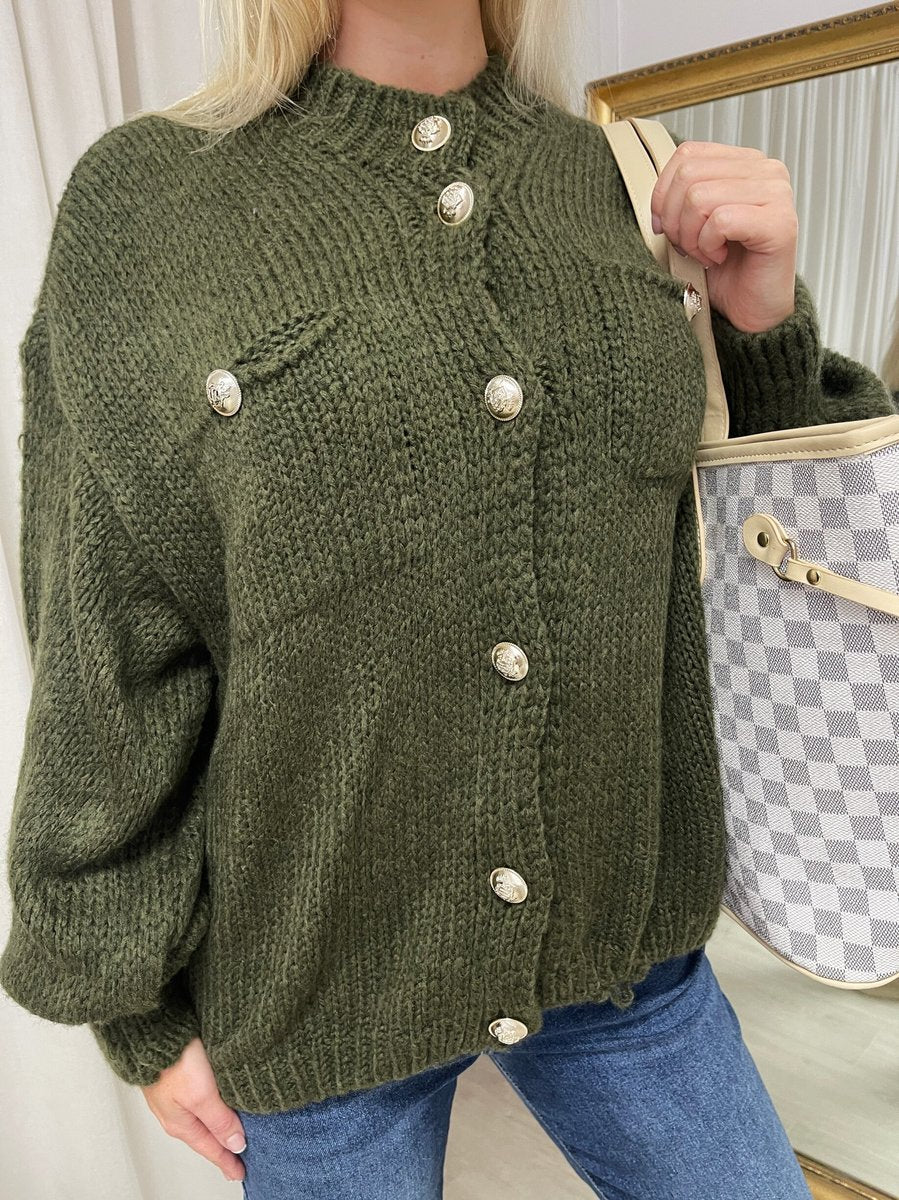 "Oversized green button-down chunky knitted top with a relaxed fit, crafted from premium knit fabric for a cozy and stylish look."
