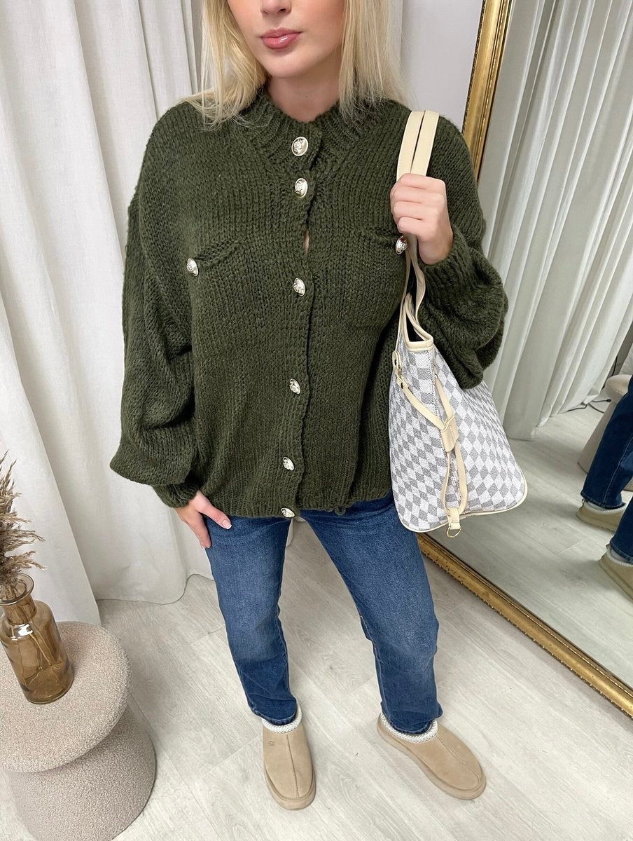"Oversized green button-down chunky knitted top with a relaxed fit, crafted from premium knit fabric for a cozy and stylish look."