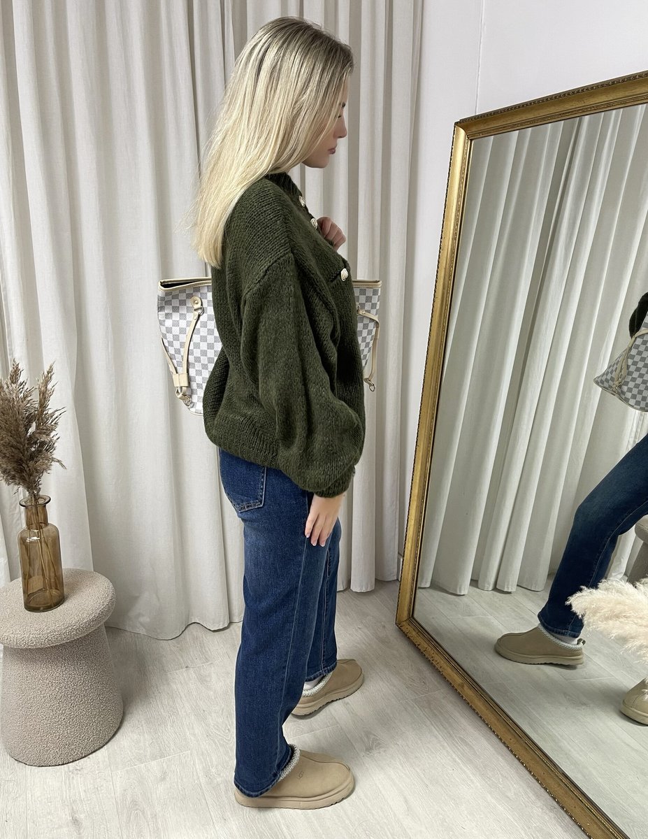 "Oversized green button-down chunky knitted top with a relaxed fit, crafted from premium knit fabric for a cozy and stylish look."