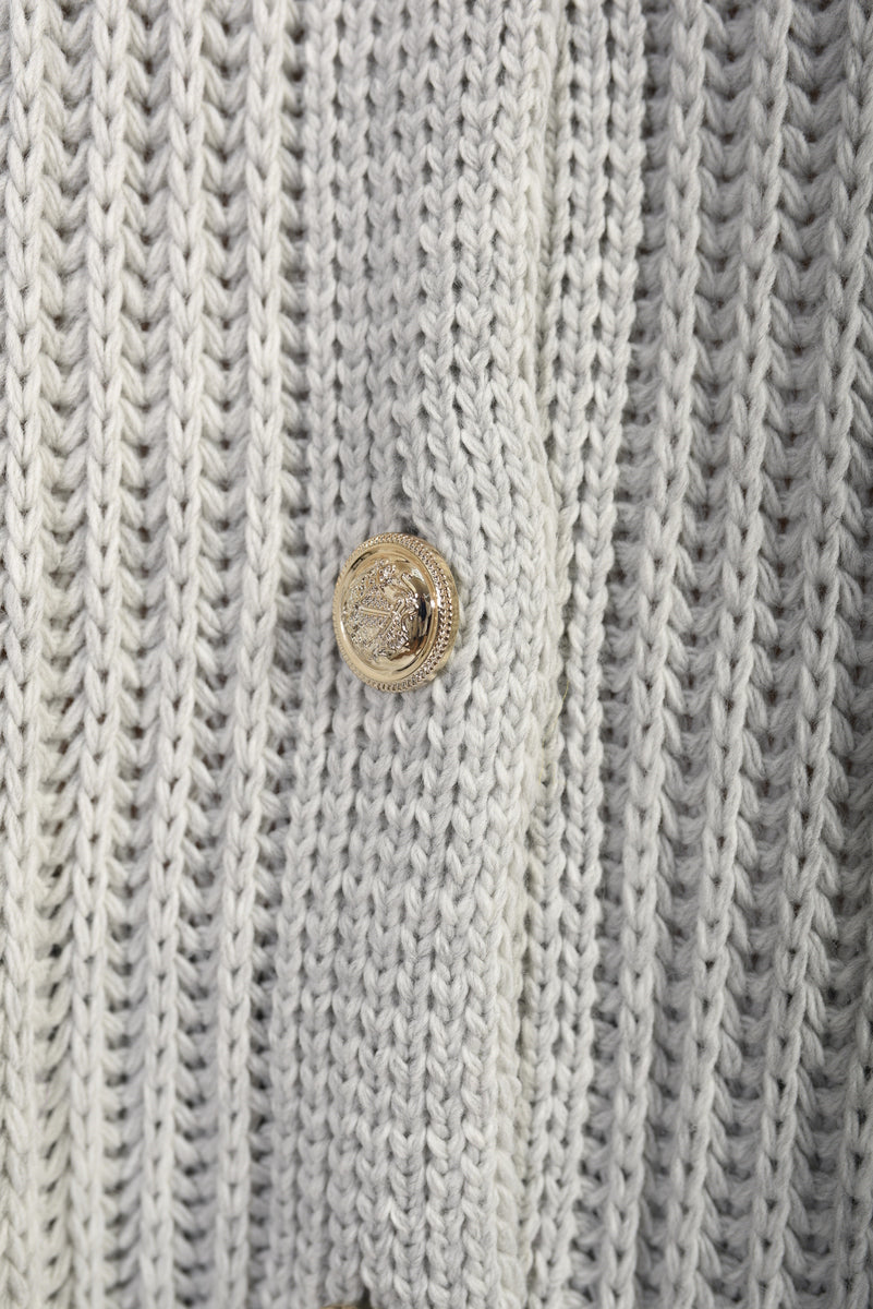 "Oversized grey chunky knitted top with a relaxed fit, crafted from premium knit fabric for a cozy and stylish look."