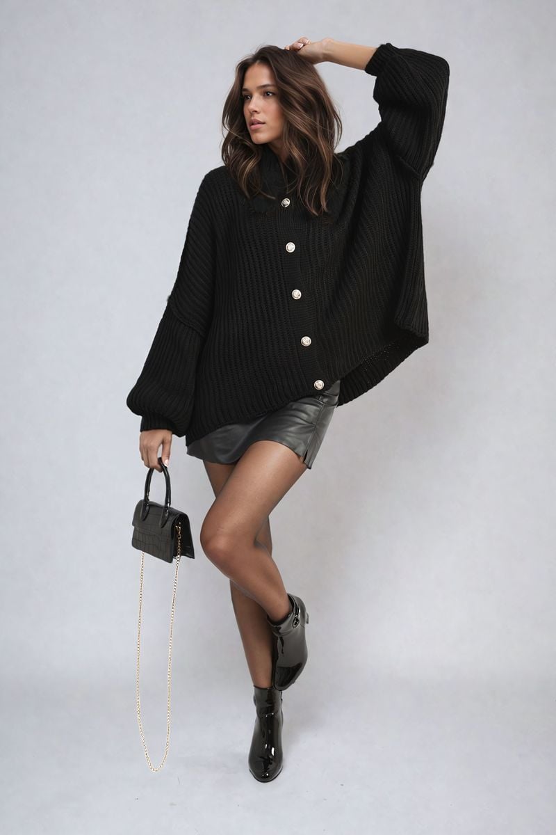 "Oversized black chunky knitted top with a relaxed fit, crafted from premium knit fabric for a cozy and stylish look."