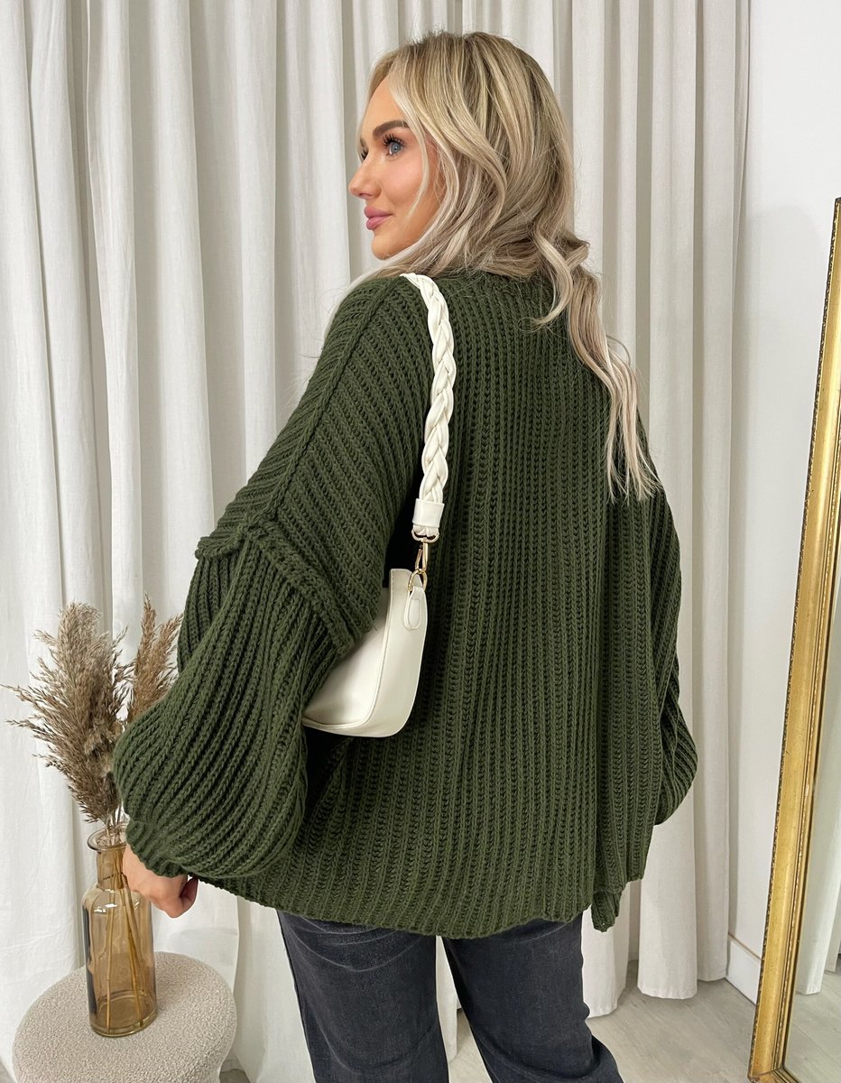 "Oversized green chunky knitted top with a relaxed fit, crafted from premium knit fabric for a cozy and stylish look."