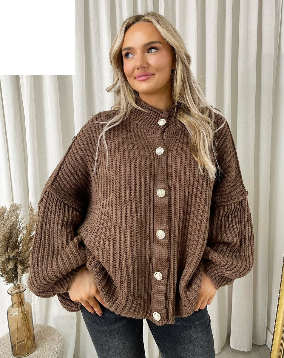 "Oversized beige chunky knitted top with a relaxed fit, crafted from premium knit fabric for a cozy and stylish look."