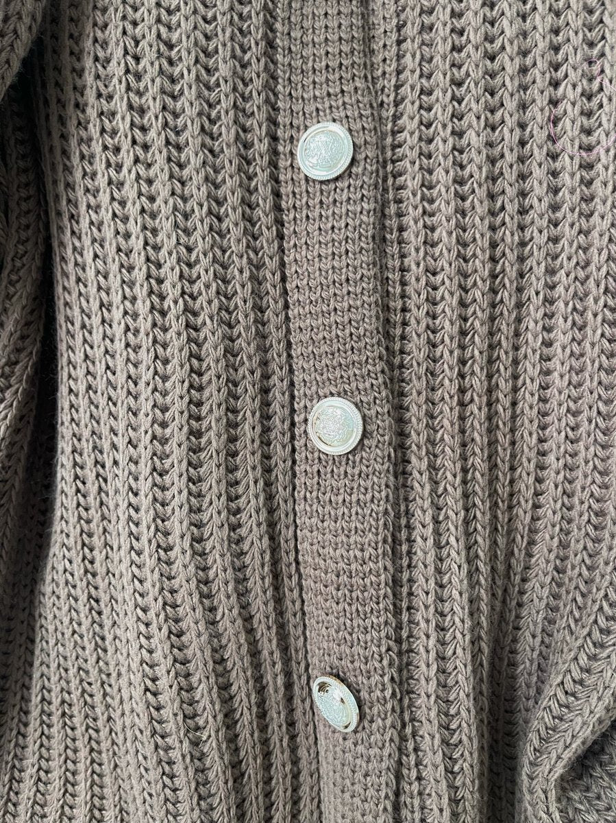 "Oversized grey chunky knitted top with a relaxed fit, crafted from premium knit fabric for a cozy and stylish look."