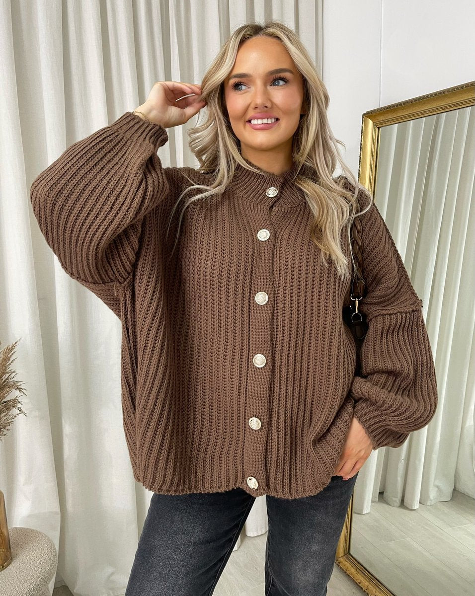 "Oversized beige chunky knitted top with a relaxed fit, crafted from premium knit fabric for a cozy and stylish look."