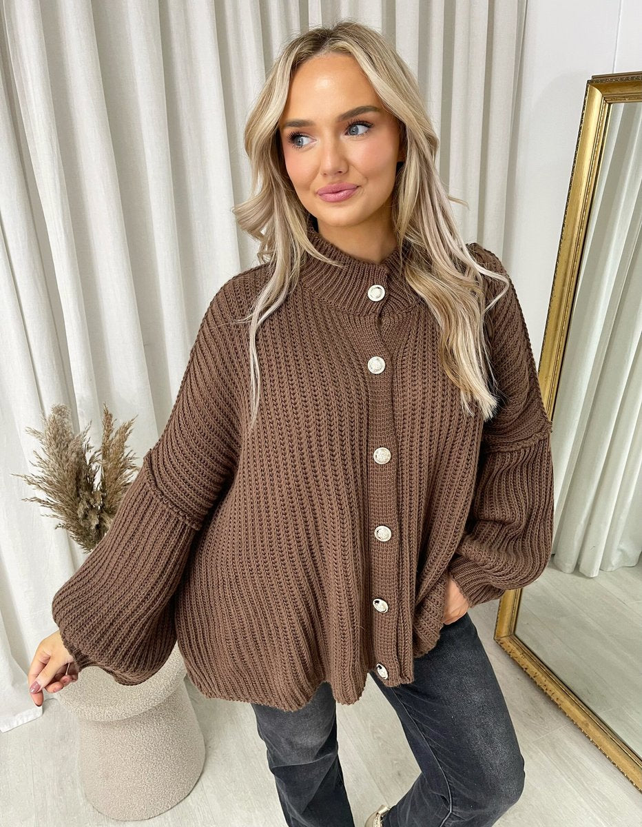 "Oversized beige chunky knitted top with a relaxed fit, crafted from premium knit fabric for a cozy and stylish look."