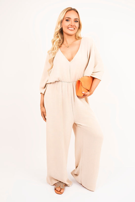 Wide Leg V Neck Jumpsuit with Back Tie Detail