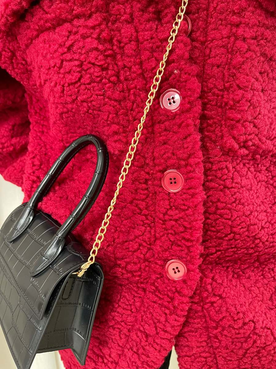 "Stylish button-down collared winter coat jacket for women in classic black, perfect for cold weather and formal occasions."