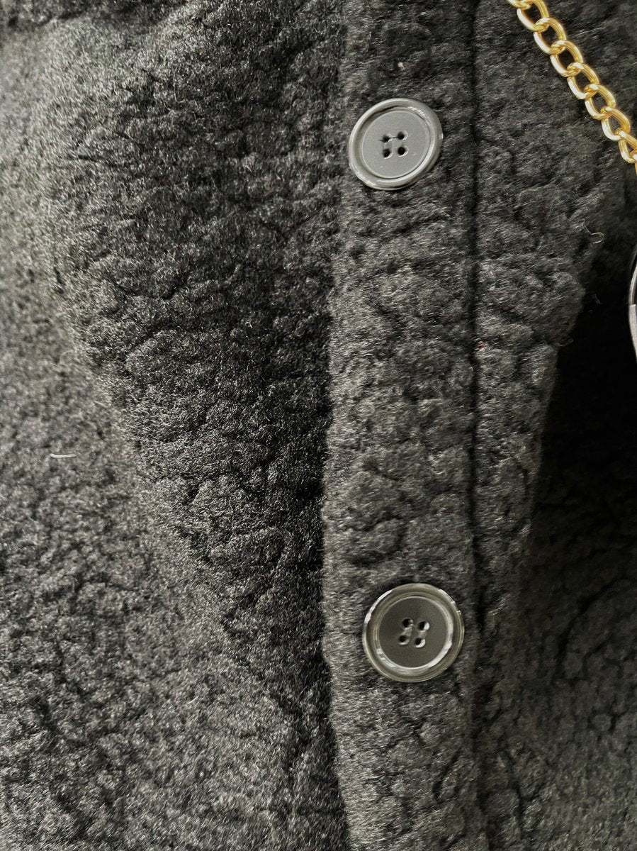 "Stylish button-down collared winter coat jacket for women in classic black, perfect for cold weather and formal occasions."