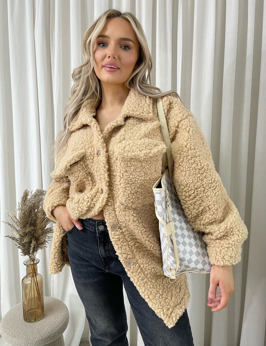 "Stylish button-down collared winter coat jacket for women in classic black, perfect for cold weather and formal occasions."
