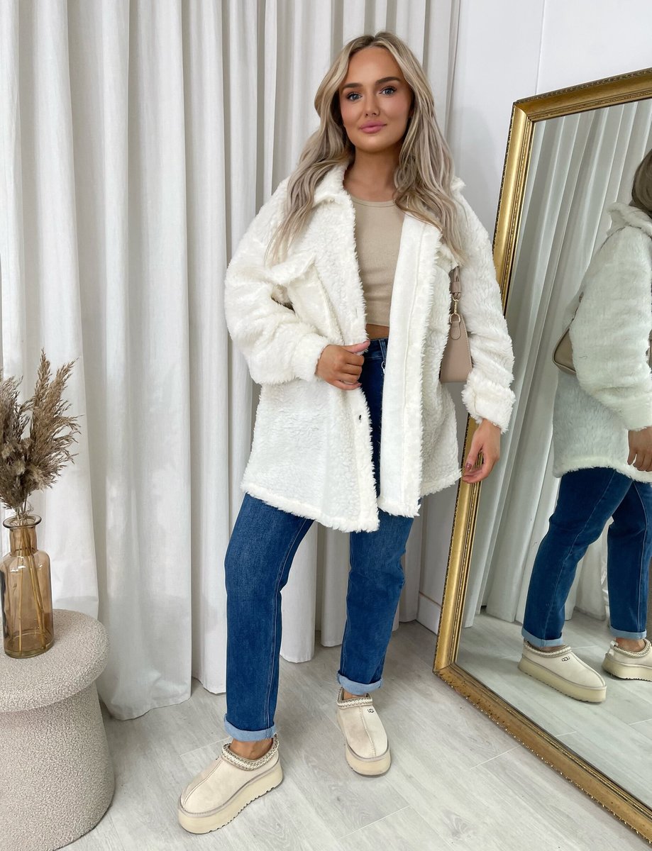 "Stylish button-down collared winter coat jacket for women in classic black, perfect for cold weather and formal occasions."