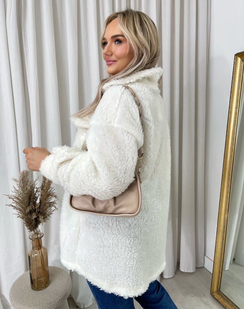 "Stylish button-down collared winter coat jacket for women in classic black, perfect for cold weather and formal occasions."