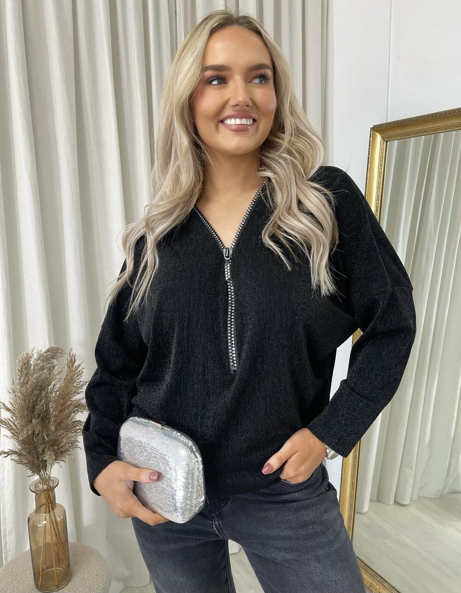"Front Zip Detail Glitz Top with a shimmering finish, featuring a sleek zip design for a stylish and versatile look."