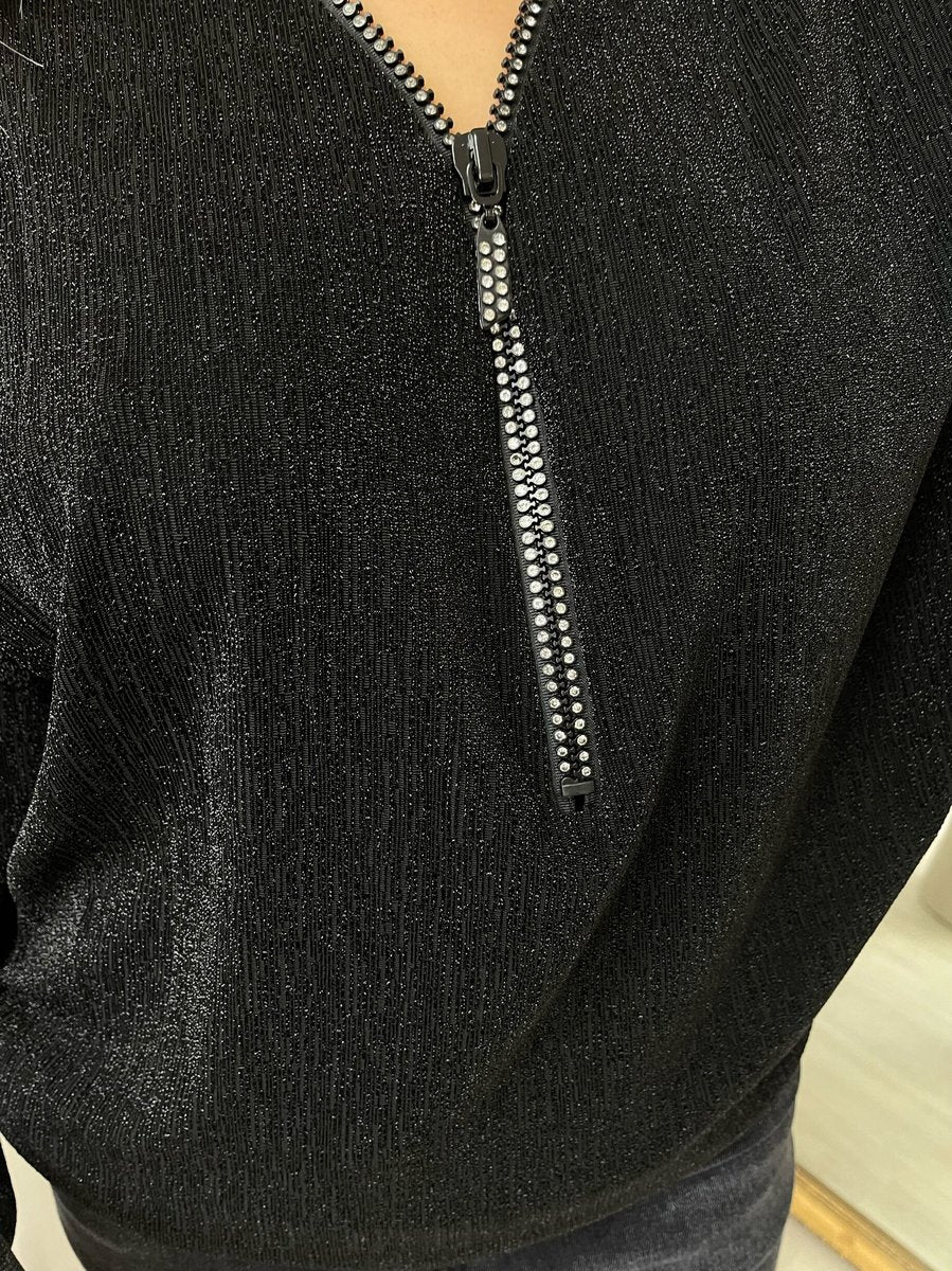 "Front Zip Detail Glitz Top with a shimmering finish, featuring a sleek zip design for a stylish and versatile look."