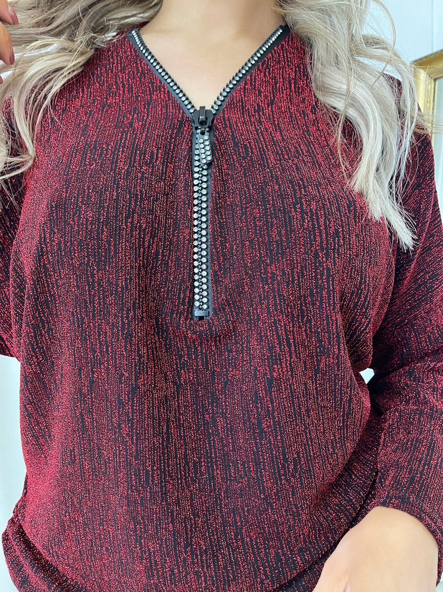 "Front Zip Detail Glitz Top with a shimmering finish, featuring a sleek zip design for a stylish and versatile look."