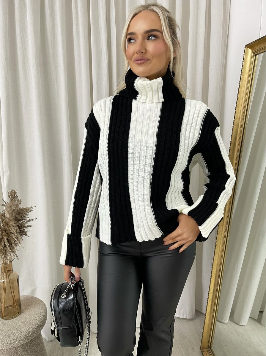 "A stylish roll neck stripe knitted jumper in soft, warm fabric, ideal for layering during chilly days."