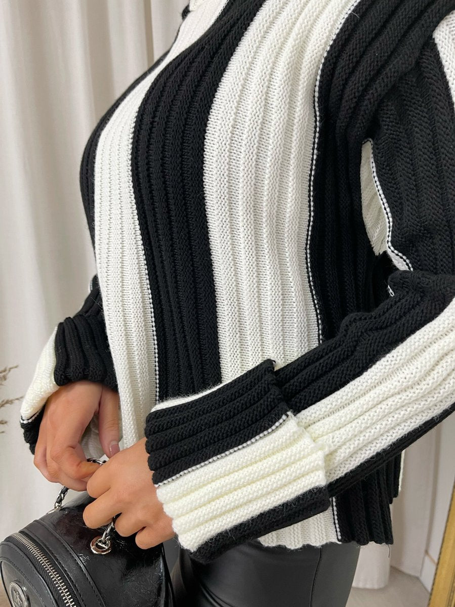 "A stylish roll neck stripe knitted jumper in soft, warm fabric, ideal for layering during chilly days."