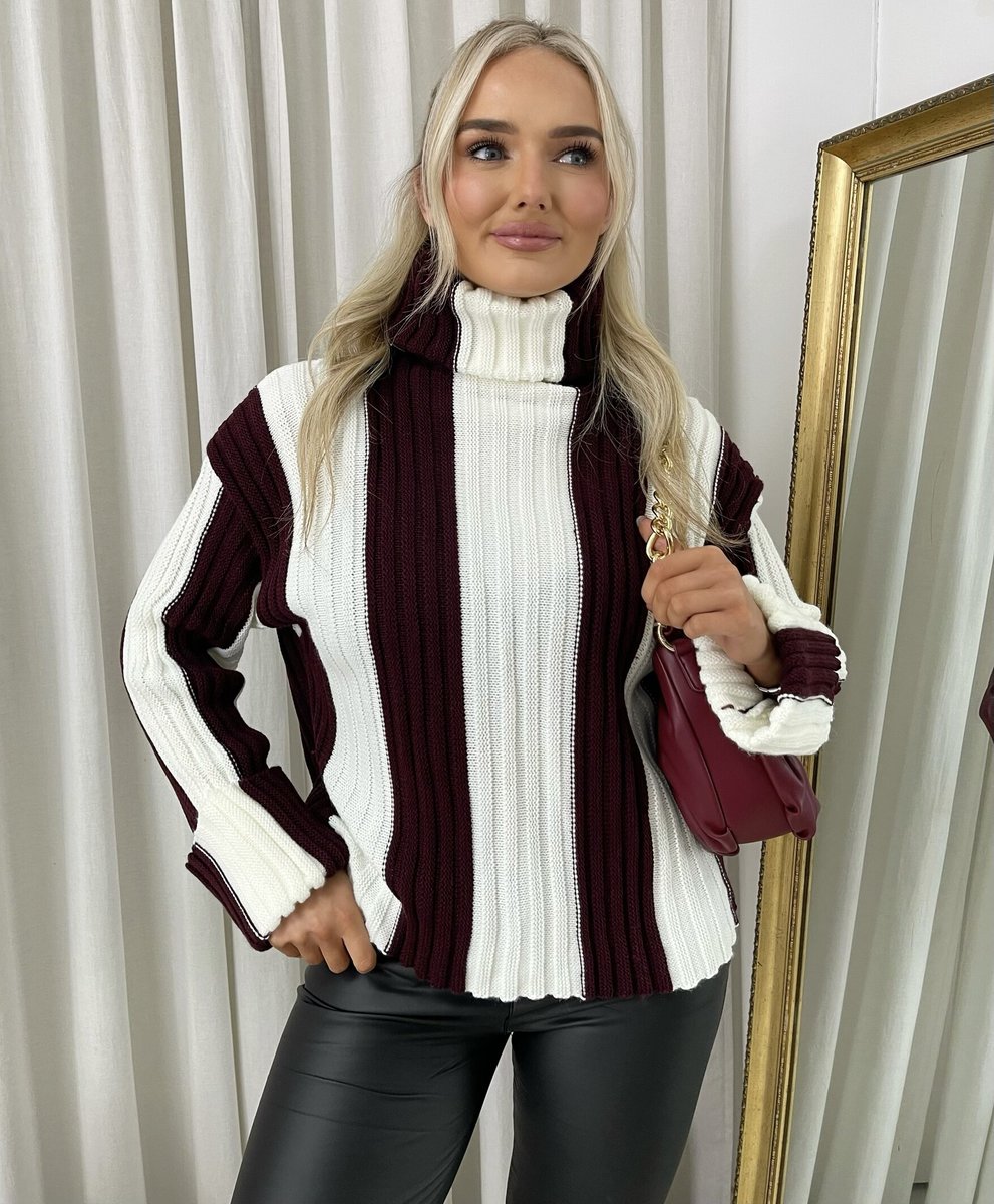 "A stylish roll neck stripe knitted jumper in soft, warm fabric, ideal for layering during chilly days."