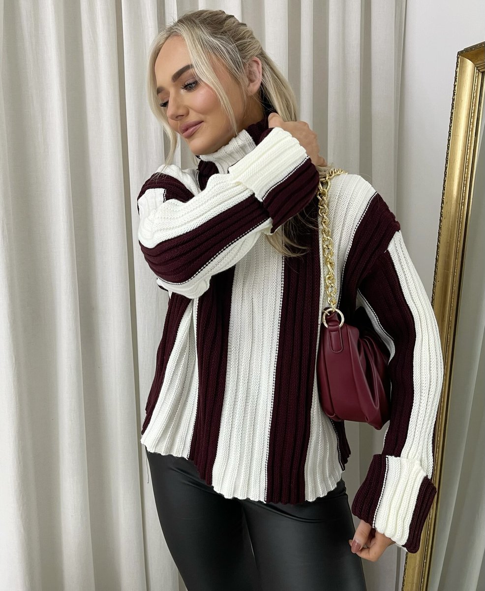 "A stylish roll neck stripe knitted jumper in soft, warm fabric, ideal for layering during chilly days."
