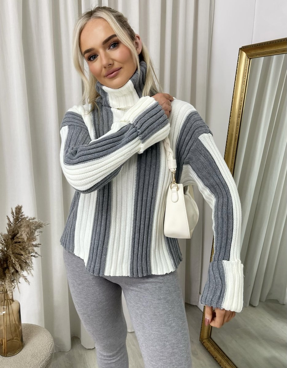 "A stylish roll neck stripe knitted jumper in soft, warm fabric, ideal for layering during chilly days."