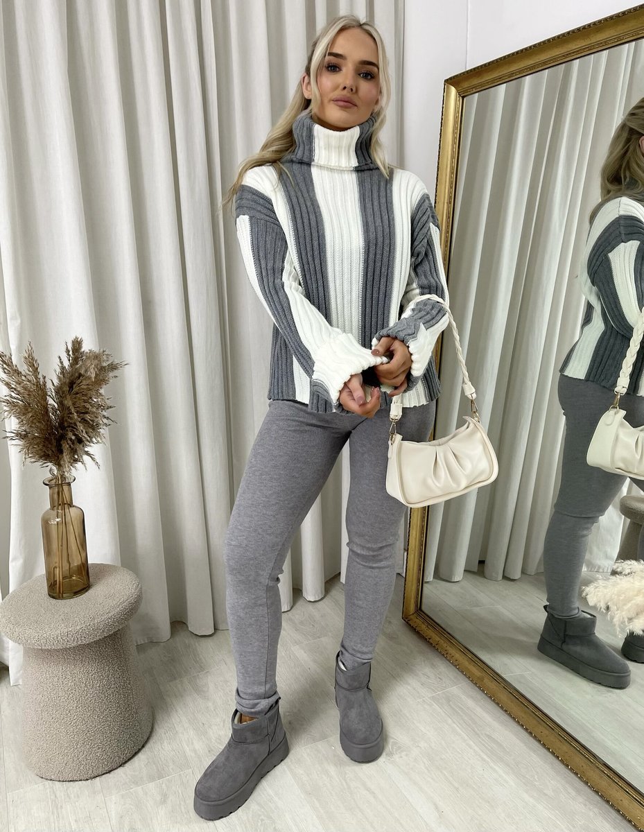 "A stylish roll neck stripe knitted jumper in soft, warm fabric, ideal for layering during chilly days."