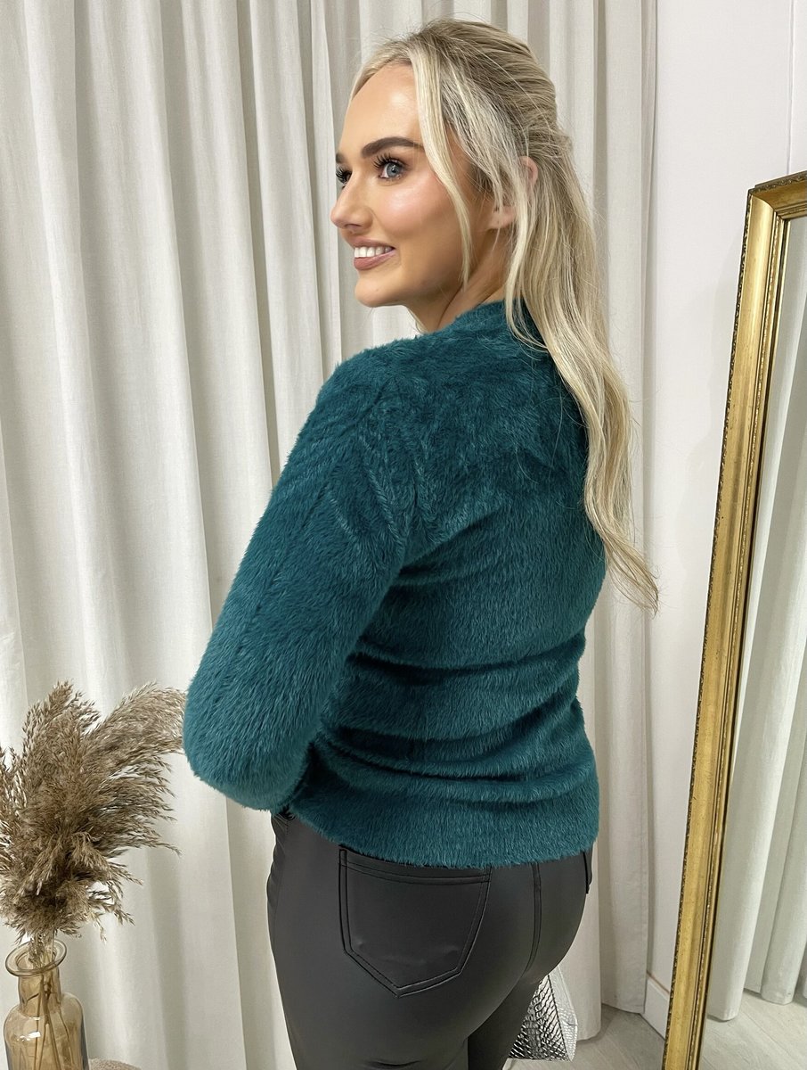 "Fitted long sleeve fluffy knitted top perfect for winter layering and cozy wear."