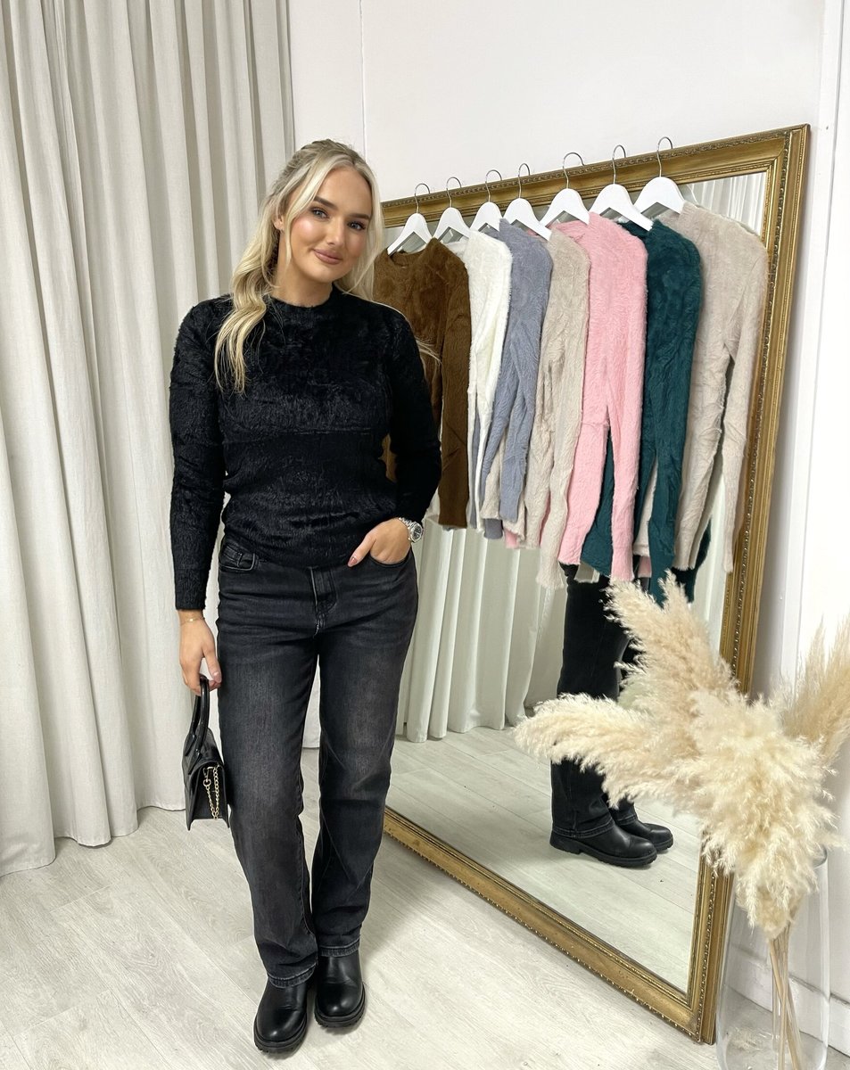 "Fitted long sleeve fluffy knitted top perfect for winter layering and cozy wear."
