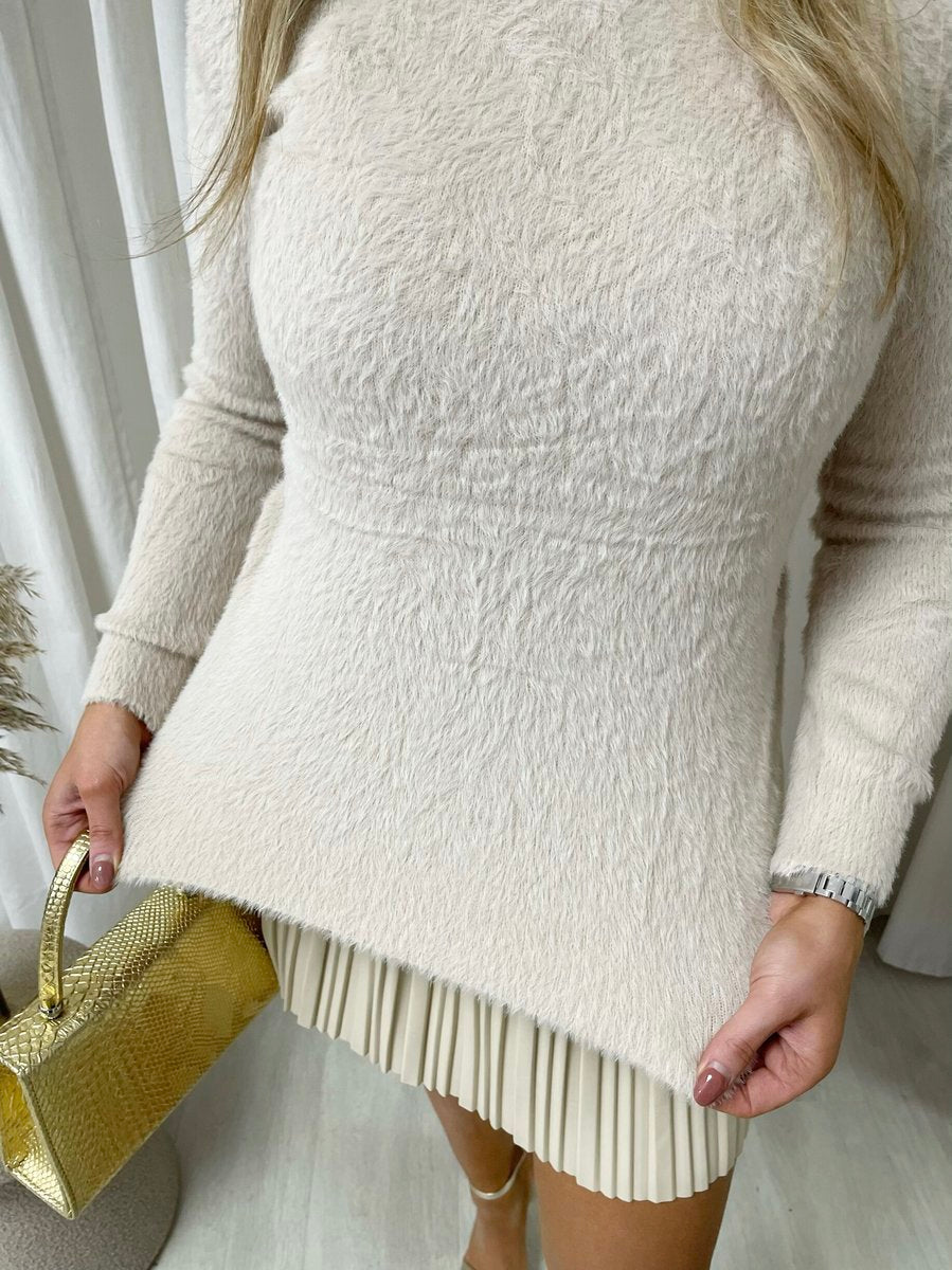 "Fitted long sleeve fluffy knitted top perfect for winter layering and cozy wear."