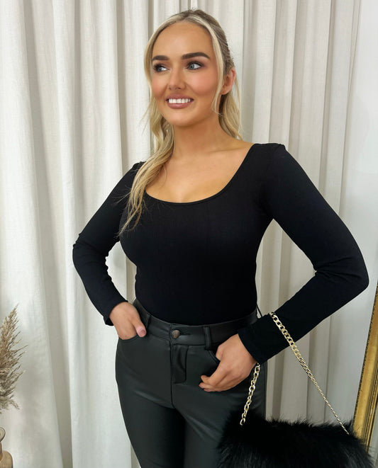 "Scarlett Long Sleeve Bodysuit in soft, stretchy material, perfect for versatile styling with jeans or skirts."