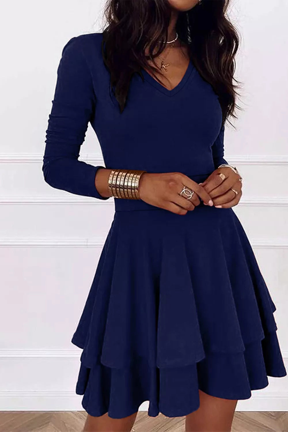 Dark navy long-sleeve V-neck mini dress with layered tiered skirt