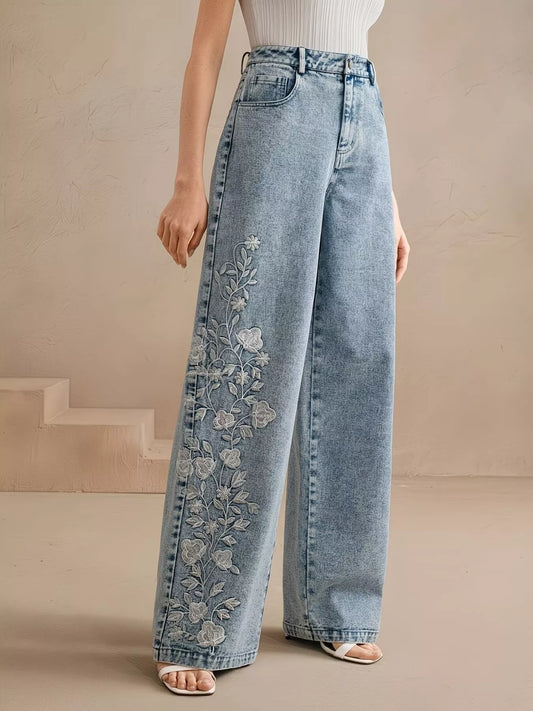 Blue wide-leg jeans with floral embroidery on side panels