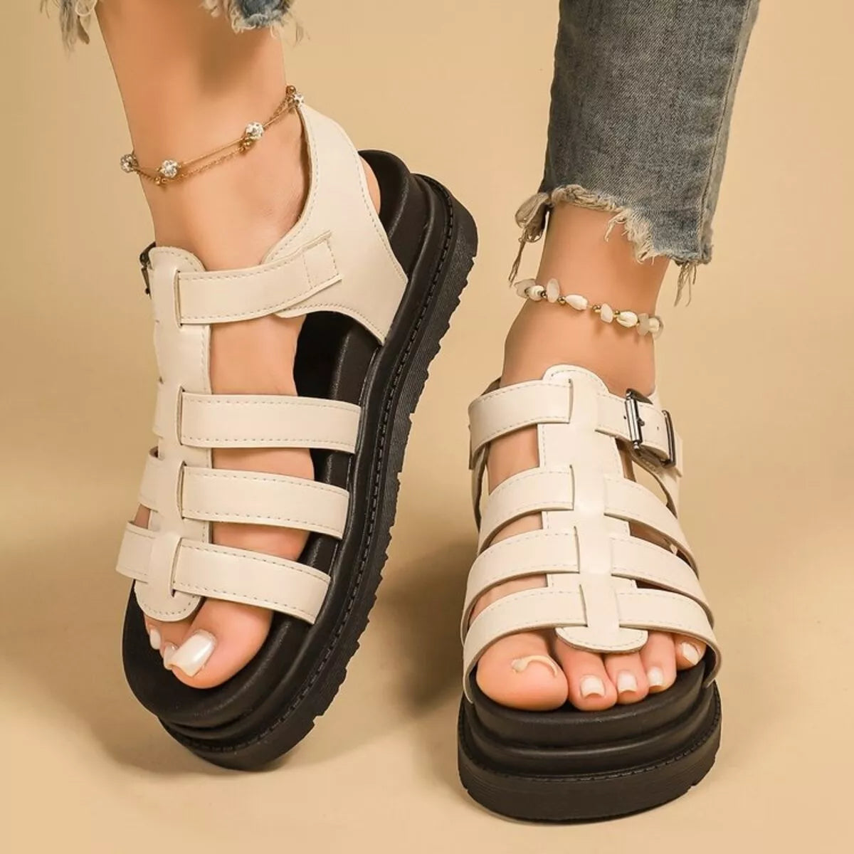 Off-white open-toe platform sandals with wide strap bands and ankle buckle