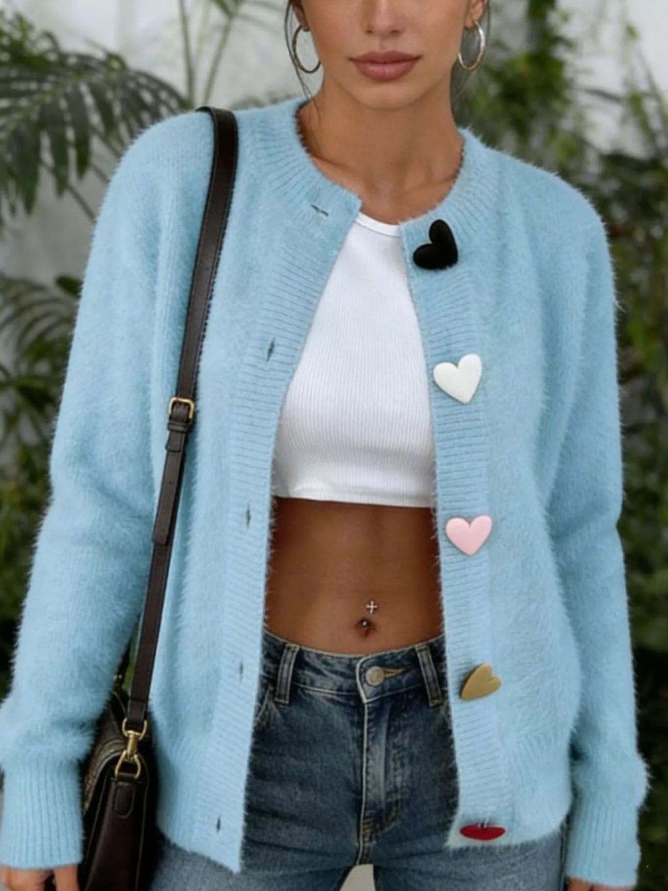 Light blue fuzzy long-sleeve cardigan with heart-button front and heart accents