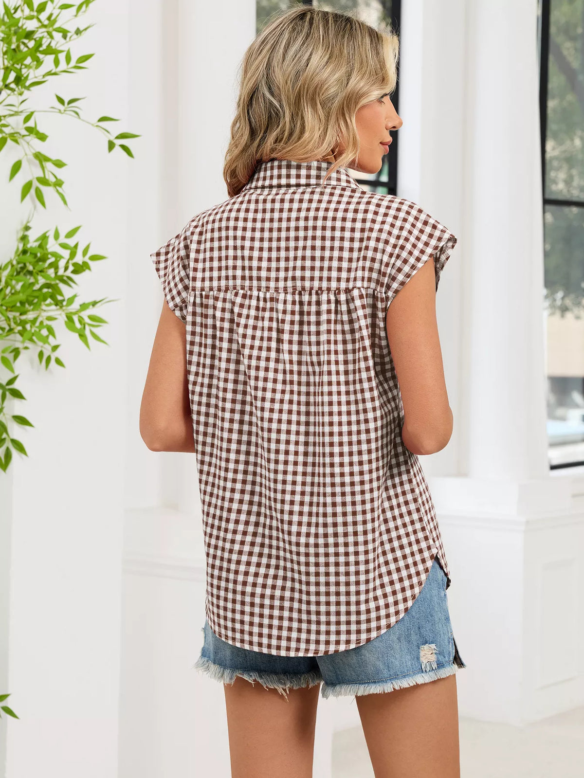 Red-and-white plaid cap-sleeve button-up shirt, back view with curved hem