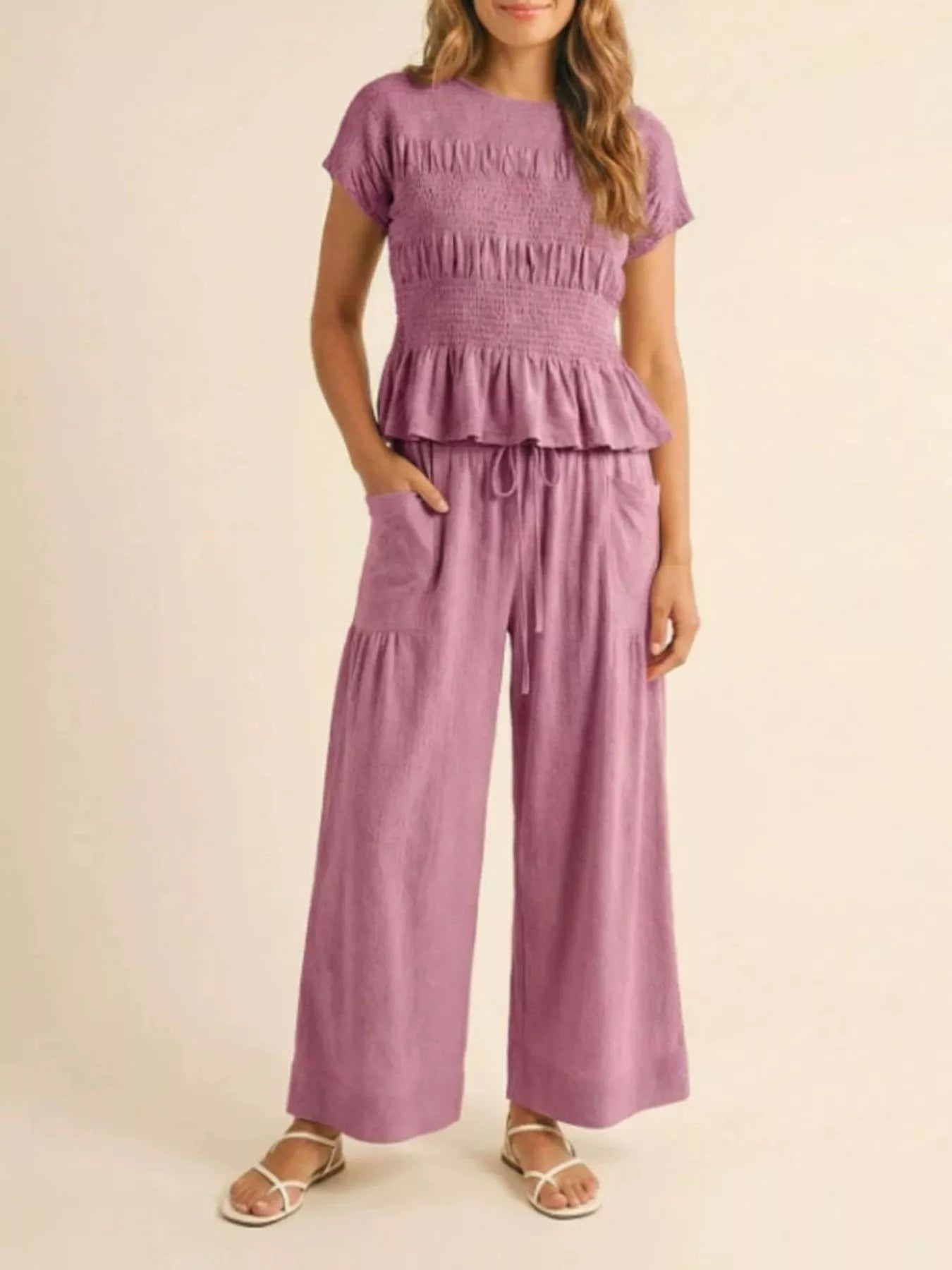 Lilac smocked peplum top and wide-leg pants set with tiered ruffle hem and drawstring waist