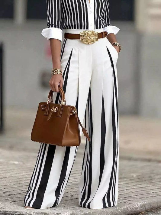 High-waisted wide-leg striped pants, white with black vertical stripes
