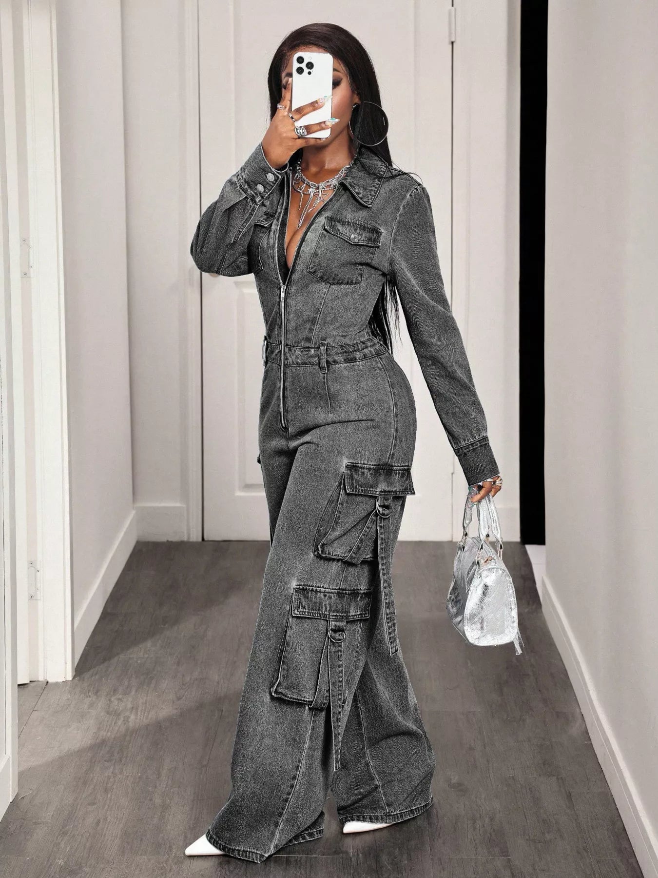 Gray denim zip-front cargo jumpsuit with wide legs and utility pockets, full-body view