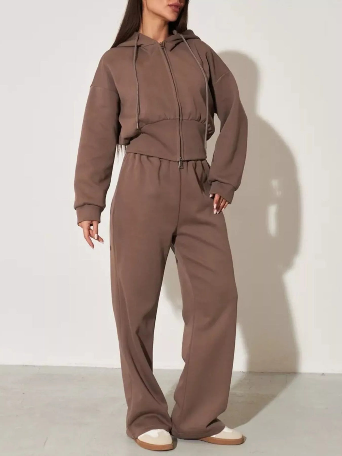 Brown zip-up hoodie and wide-leg pants set with hood and drawstring waist in a relaxed fit